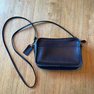 Women’s black coach purse